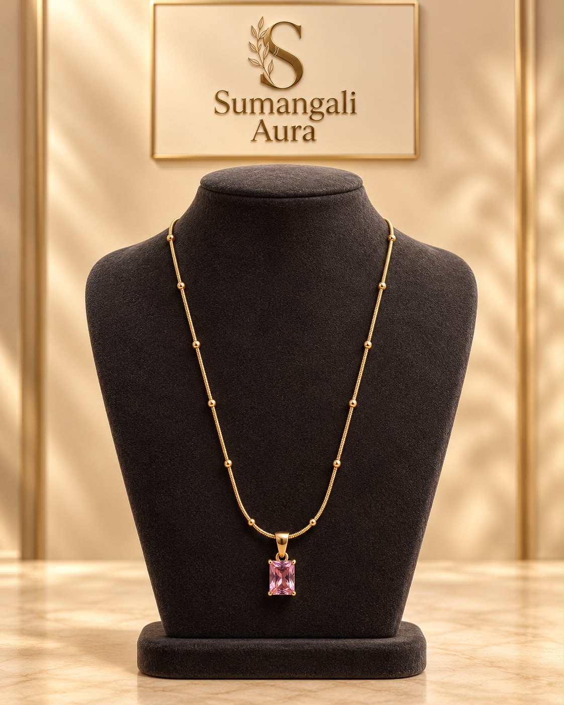 Gold-Tone Chain with Pink Pendant
